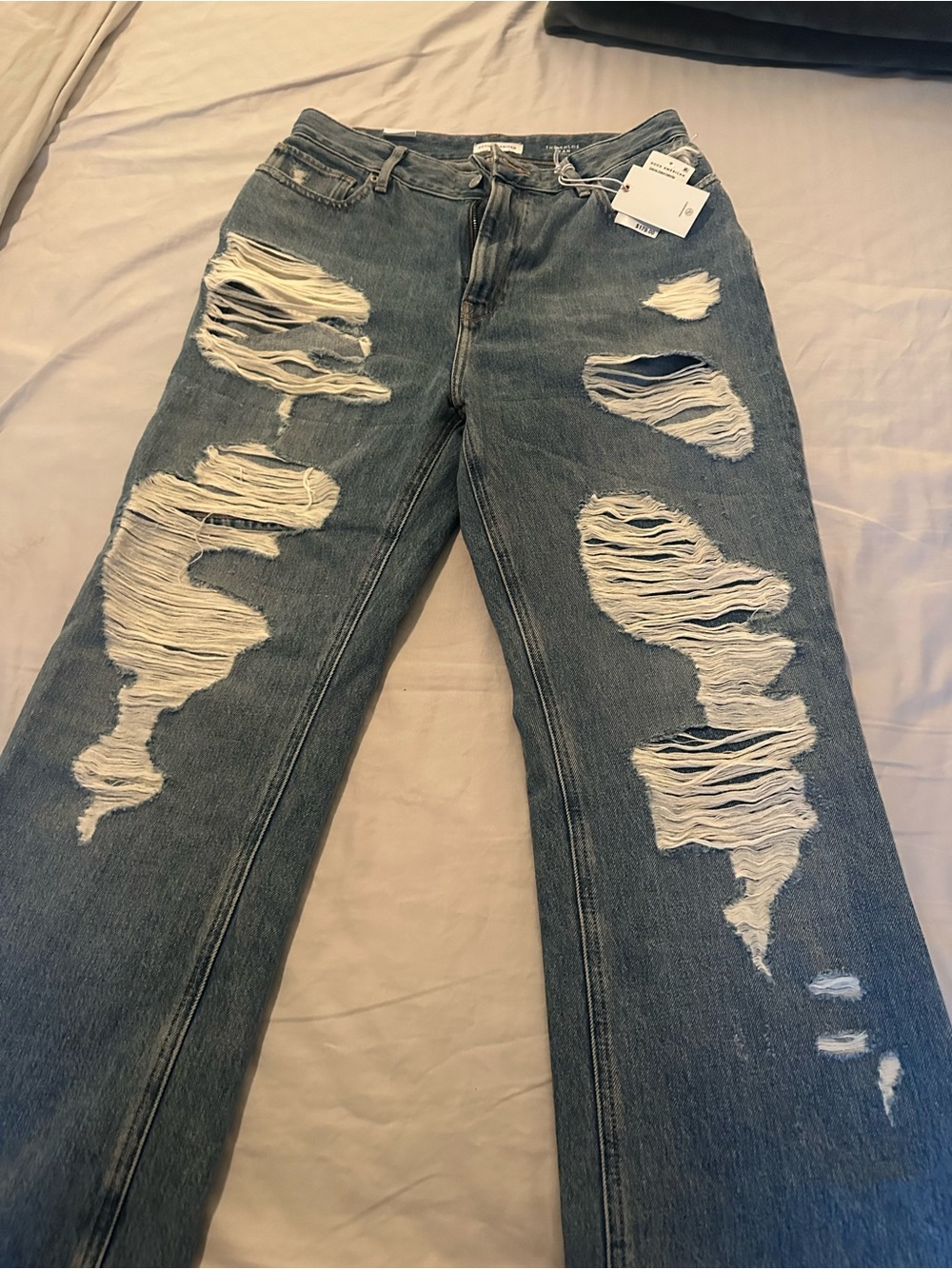 Good American Distressed Straight-Leg Jeans in Washed Blue